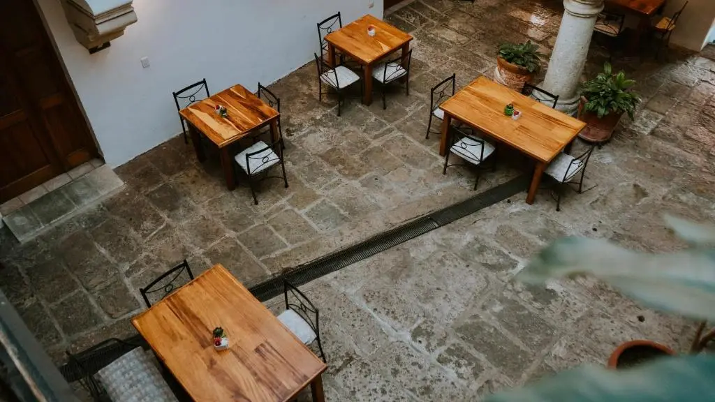 Breakfast tables in the stone courtyard